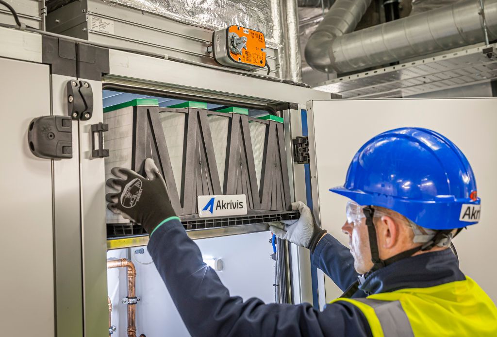 Akrivis team member installing the new HVAC solution for Beaumont Hospital